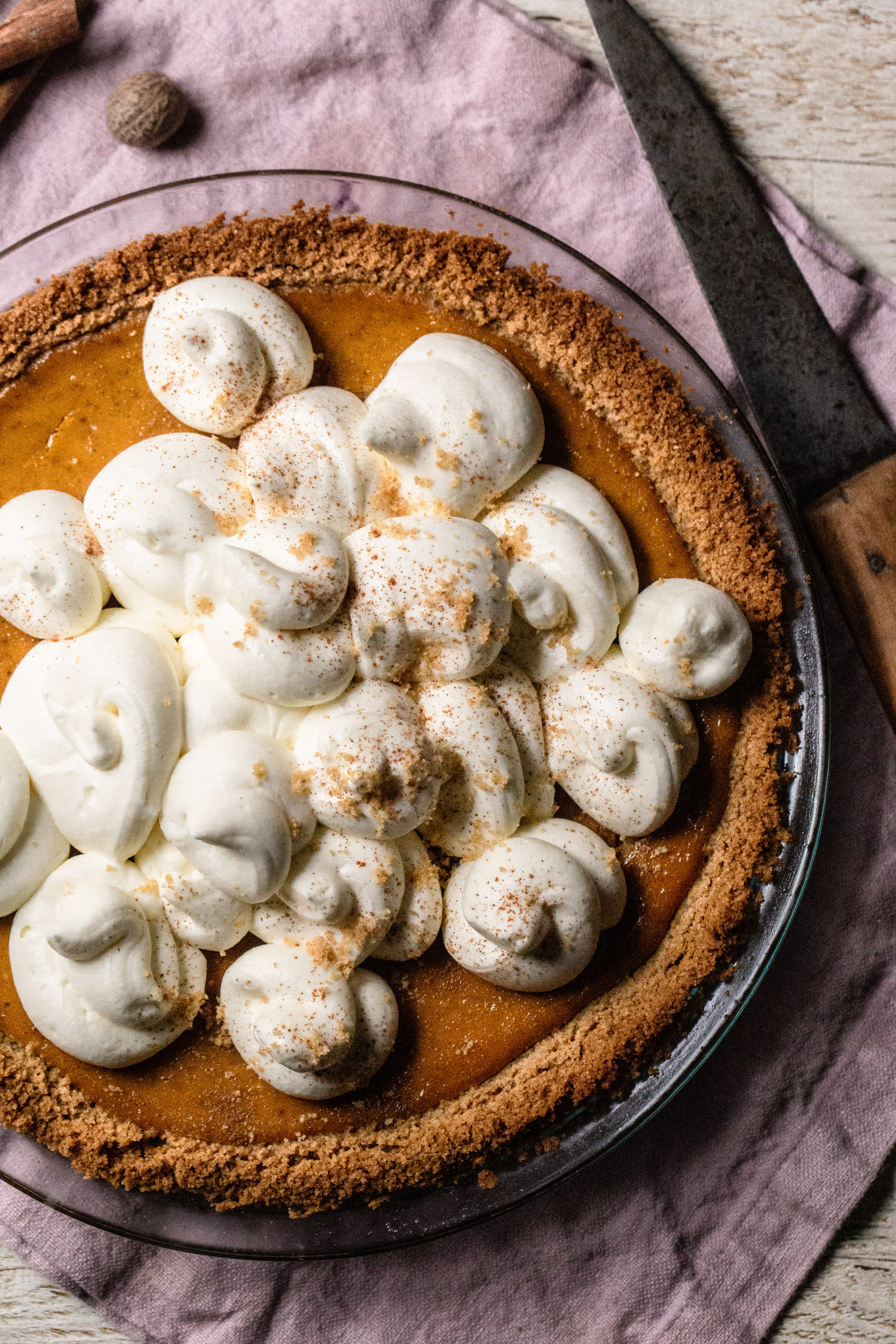 Show Stealing Black Pepper and Bourbon Pumpkin Pie with Whipped White Chocolate Ganache